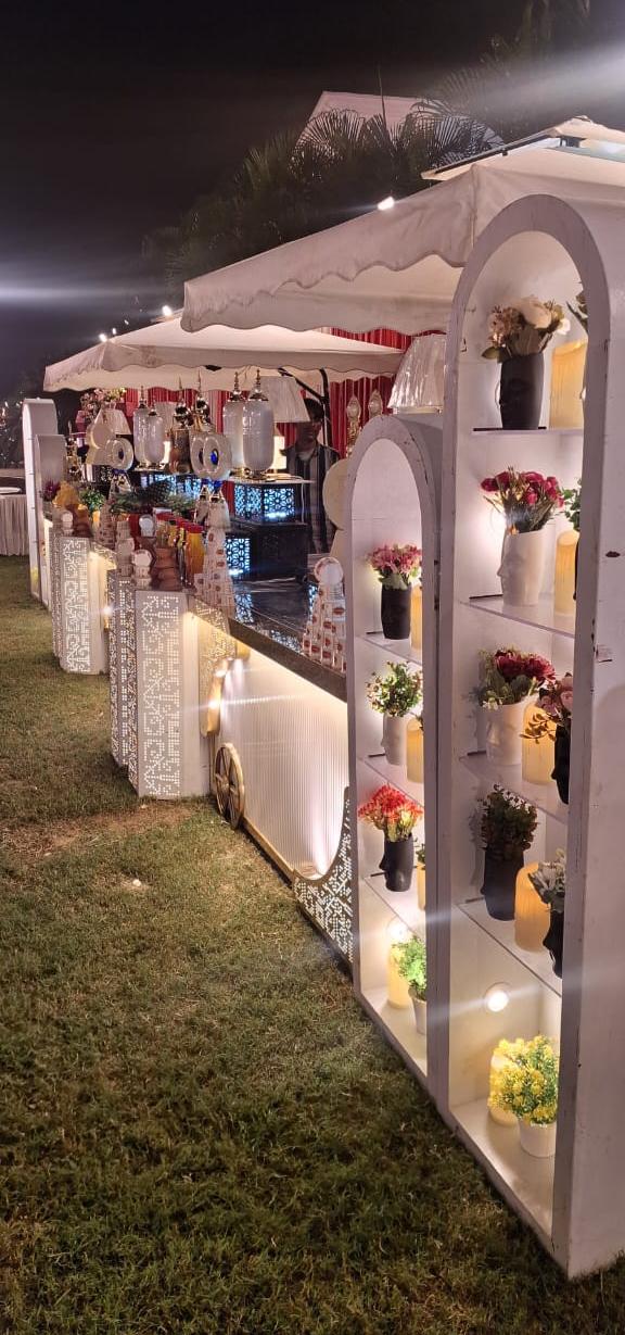 Decorated live counter with floral shelving