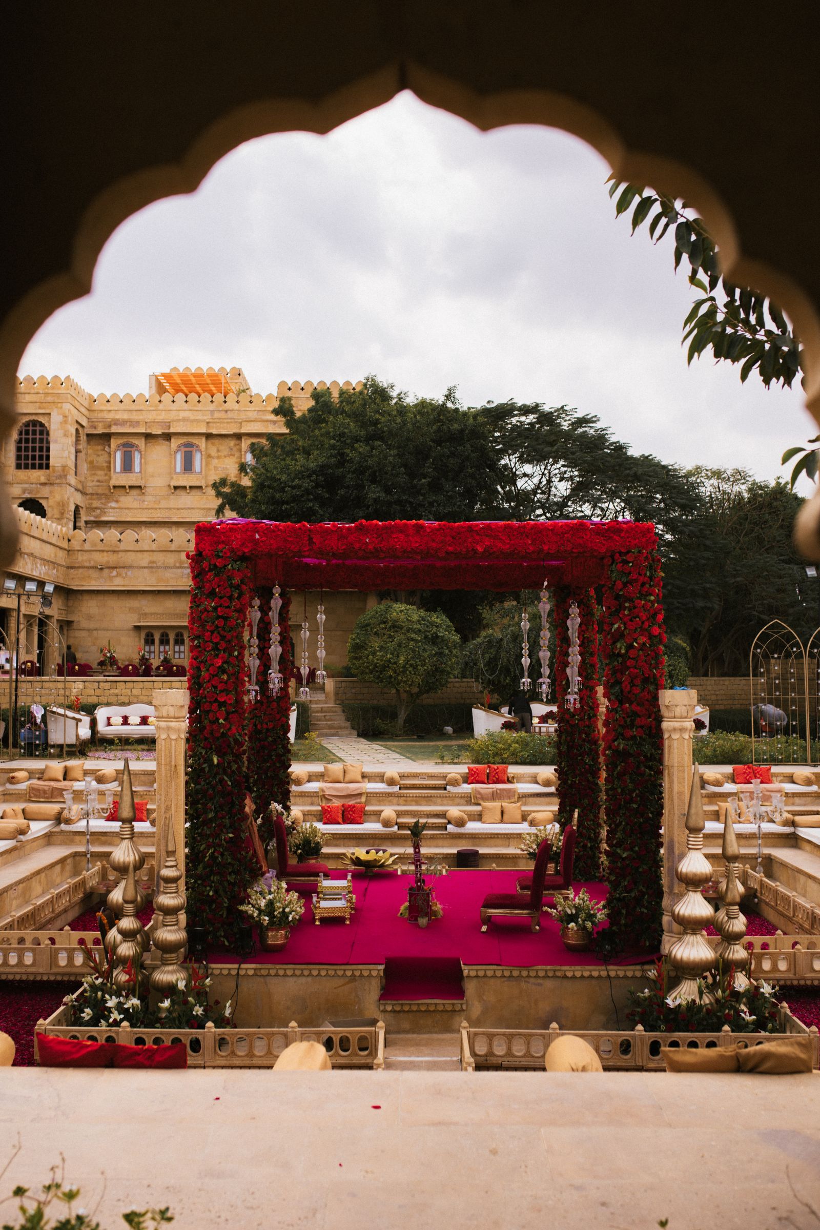 Traditional Indian wedding mandap decorated with red flowers